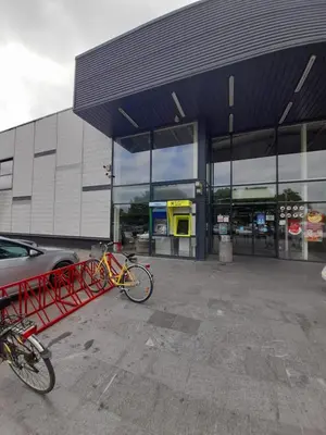 a group of bikes parked outside of a gas station at Apartman Ajla in Bihać