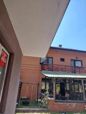 an outside view of a building with a restaurant at 33 Lipe in Travnik