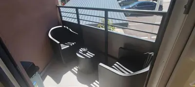 an overhead view of a balcony with two chairs at Apartmani Sarah 4 Tuzla in Tuzla