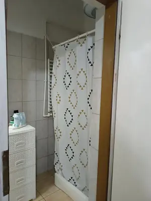 a shower curtain in a bathroom with a sink at Mountain Relax Vlašić in Vlasic