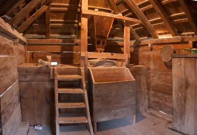 a kitchen with a ladder and a stove in a room at Farm Stay Čardaklije in Kulen Vakuf