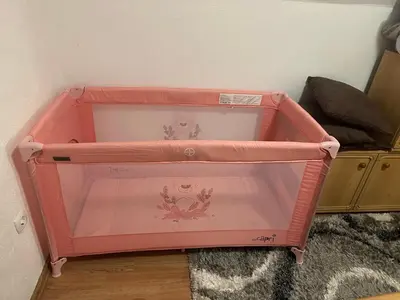 a pink dresser in a corner of a room at B&B Hills Bihać in Bihać