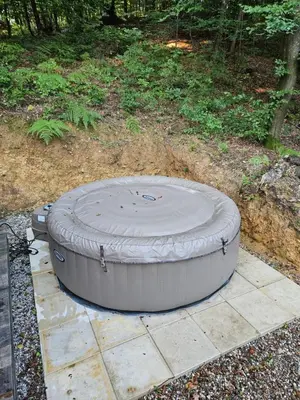 a large circular object sitting on the ground at Apartman Košuta in Laktaši