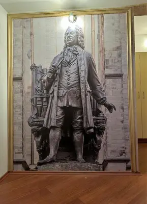 a statue of a man standing in a room at Deutsches Haus Livno in Livno