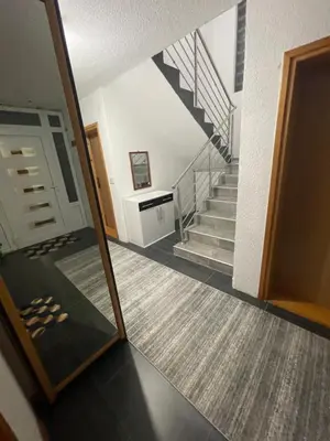 a mirror reflection of a staircase in a house at Villa ADA in Jajce