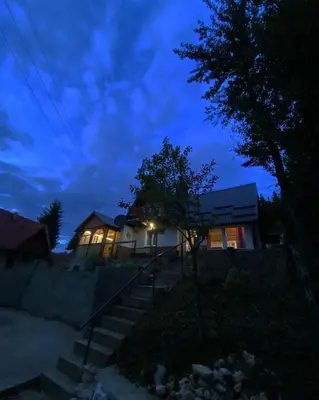 a house at night with the lights on at Vikendica Amra i Indir in Travnik
