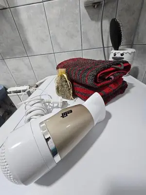 a robot is on a table in a room at Apartman Nira in Zenica