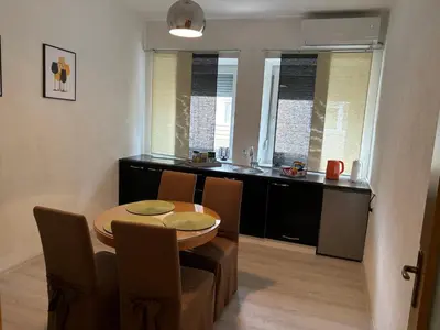 a kitchen and dining room with a table and chairs at Anna in Livno