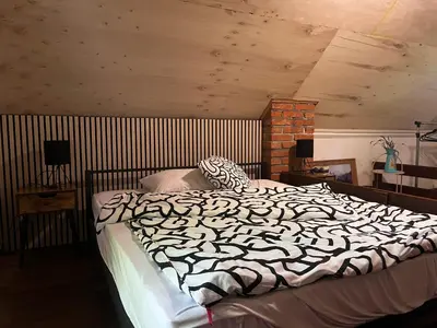 a bedroom with a zebra print bed in a room at ALBAK Green Zone in Gradačac