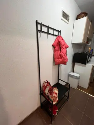a room with a clothes rack and a toilet at ALBAK Green Zone in Gradačac