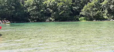 a group of people in a boat in the water at Holiday home Dani in Bihać
