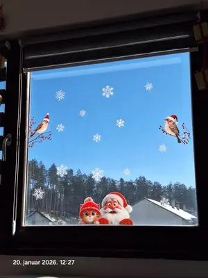 a television screen with a picture of santa claus at Stan na dan Grahovo in Bosansko Grahovo