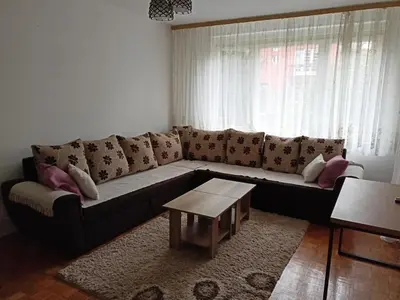 a living room with a couch and a coffee table at Apartmani Vesna in Banja Luka