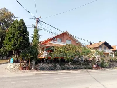 a house sitting on the side of a street at Stara Ruža in Gračanica
