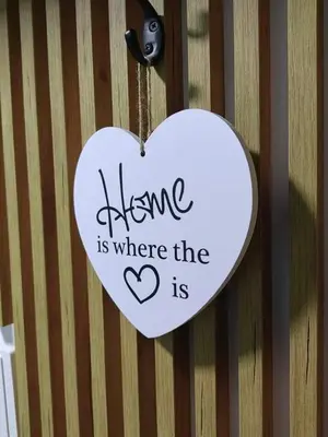 a heart shaped sign that saysine is where the heart is at APARTMAN ANIKA - STAN NA DAN Doboj in Doboj