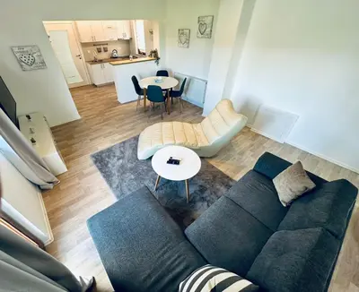 a living room with a couch and a table at Vila Milincic Loft Milincic in Banja Luka