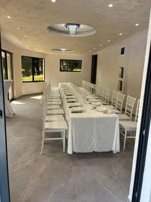a conference room with a long table and chairs at Villa Tea - Slatina in Laktaši