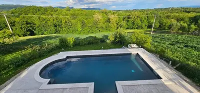 an overhead view of a swimming pool in a backyard at Vikendica OM relax in Prijedor