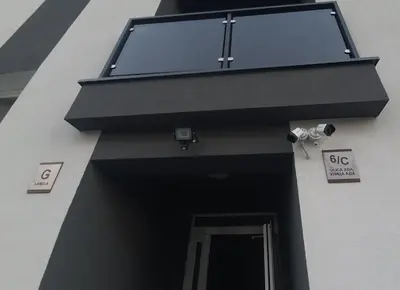 a building with a window on the side of it at Apartman Ada Banja Luka in Rebrovac