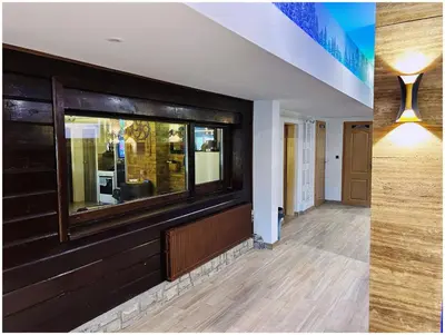 a hallway with a window in a building at Villa Almedina Spa in Vlasic