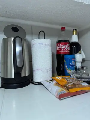 a roll of paper towels sitting on top of a counter at Stan na dan Hasanovic in Tuzla