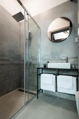 a bathroom with a sink and a mirror at LANTerna Boutique Hotel in Srbac