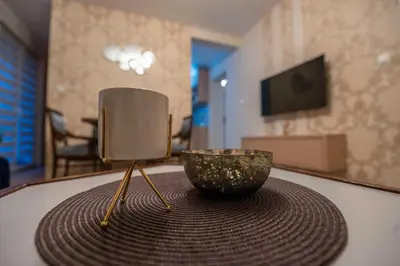 a bowl sitting on top of a table at Calendula apartments in Tuzla