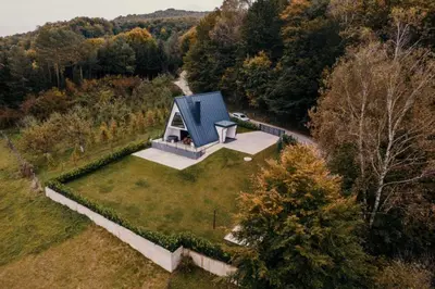an aerial view of a small house in a field at Vila Hasandić in Visoko