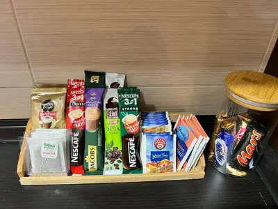 a tray filled with different types of food and snacks at Apartman Sudnica Banja Luka in Banja Luka