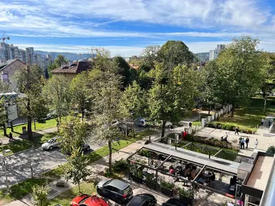 an overhead view of a street with cars and a bus at Apartman Sudnica Banja Luka in Banja Luka