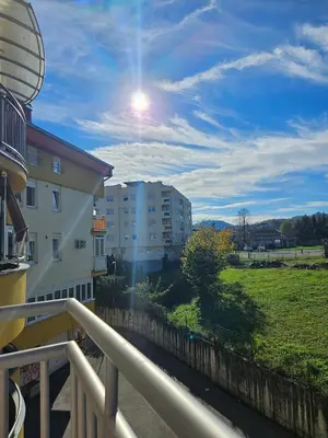 a balcony with a view of a field and buildings at Apartman Lollita in Banja Luka