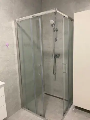a shower with a glass door in a bathroom at ,,Azra,, Apartment in Bihać
