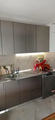 a kitchen with a sink and a counter top at Topli dom in Banja Luka