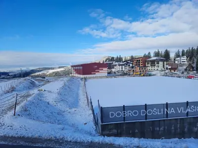 a sign fordoronga dushka village in the snow at VilaBellavistasmjestaj in Vlasic