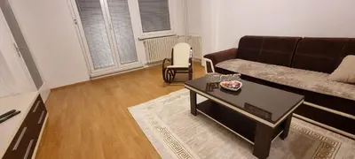 a living room with a couch and a coffee table at Apartman Borik Banjaluka in Banja Luka