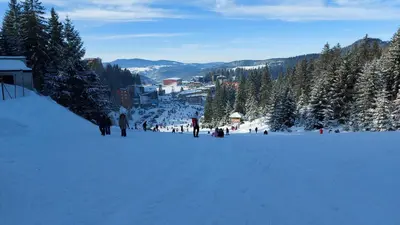 a group of people standing on a snow covered slope at Apartment XYZ Vlašić in Vlasic