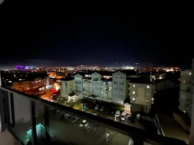 a view of a city at night at Apartman Vista Banja Luka in Banja Luka