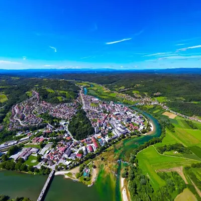 an aerial view of a small town next to a river at Apartman Capital Novi Grad in Bosanski Novi