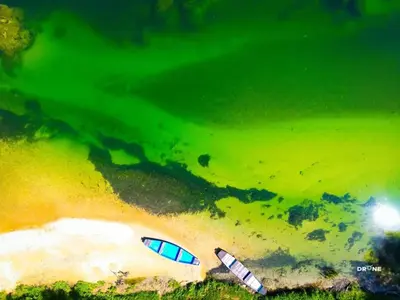 an aerial view of a beach with two surfboards at Apartman Capital Novi Grad in Bosanski Novi