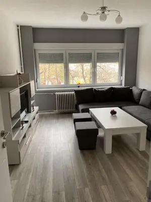 a living room with a couch and a table at Apartman Ćetojević in Banja Luka