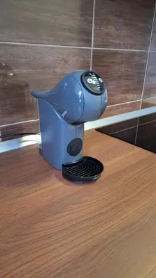 a hair dryer sitting on top of a table at Apartman Dolly Bell in Kotor-Varoš