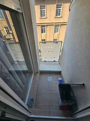 a view of a balcony with a laptop on a table at MARICELO in Banja Luka