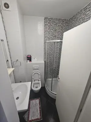 a bathroom with a shower and a toilet and a sink at MARICELO in Banja Luka