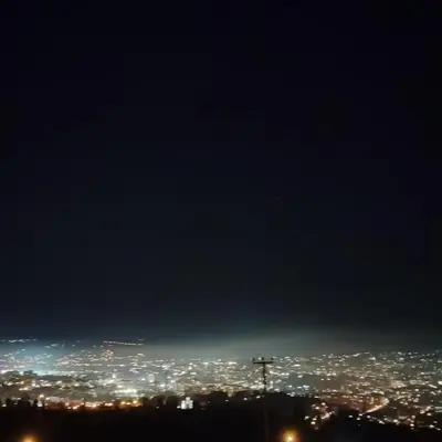 a view of a city at night with lights at Vila Šibovi in Banja Luka