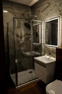 a bathroom with a shower and a sink at S Apart Rooms in Bosanska Gradiška