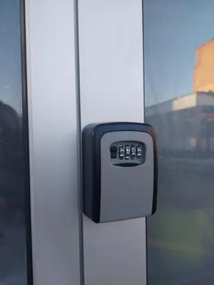 a ticket dispenser on the side of a train at Apartman Magus in Tuzla