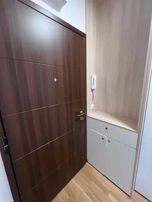 a room with a closet with a wooden door at Romanijska in Banja Luka