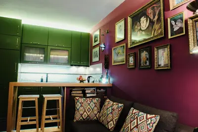 a living room with a couch and a bar at Divan Apartman u Banjaluci in Banja Luka