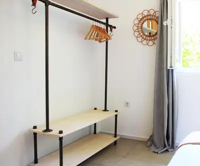 a shelf in the corner of a room at Apartment Pirol: Dorf Hideaway Gornja Breza in Breza