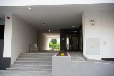 a stairway leading to a building with a door at Harmony Space Apartment in Banja Luka